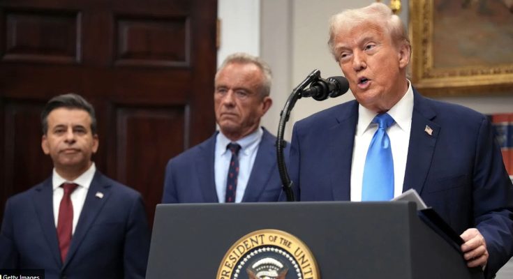 Donald Trump speaking at presidential podium with two offici