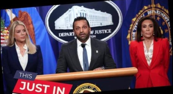 Man speaking at DOJ press conference with two women beside