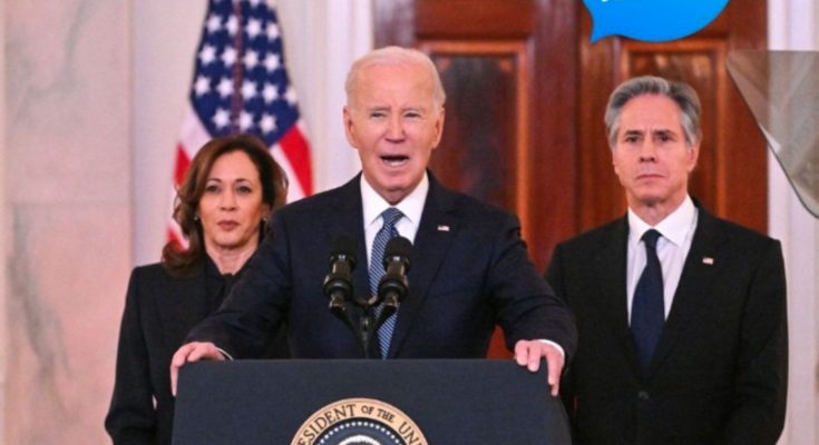 President Biden speaking at podium with Kamala Harris