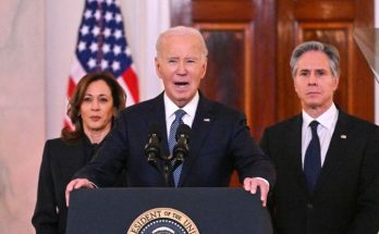 Biden Harris Schumer at podium