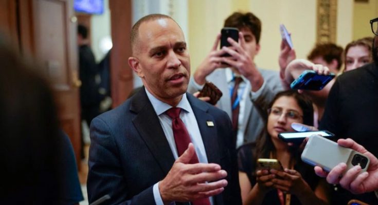 Hakeem Jeffries speaks to reporters