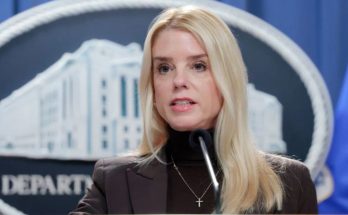 Pam Bondi speaks at DOJ podium