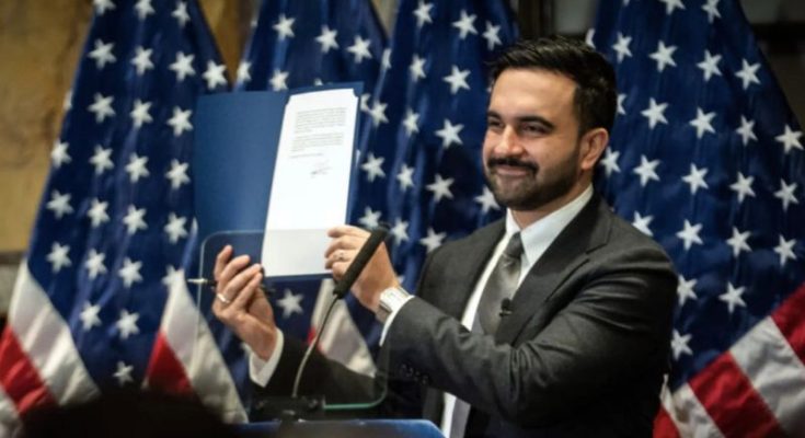 Man holding document in front of American flags