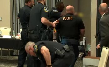 Police arresting suspect