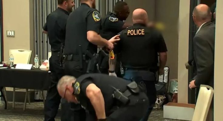 Police arresting suspect