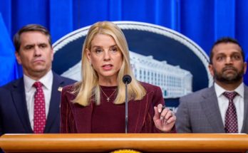 Pam Bondi speaks at DOJ podium