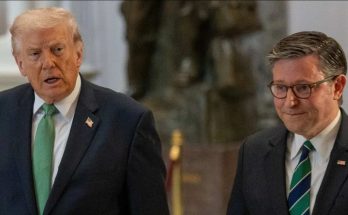 donald Trump and Mike Johnson walk side by side in formal suits with serious expressions
