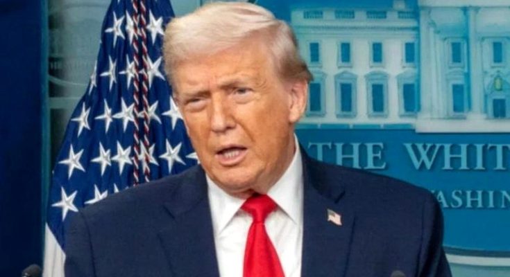 donald Trump speaks at White House podium with American flag and presidential seal