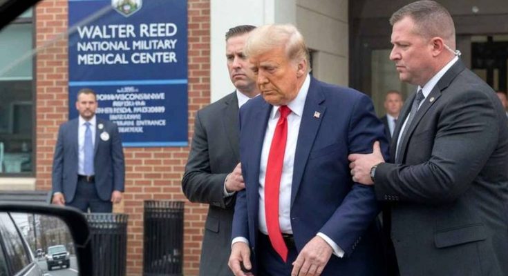 donald Trump in navy suit and red tie being escorted by Secret Service agents outside