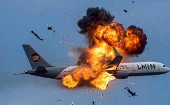 commercial jet with LMIM livery explodes mid-air, sending debris and flames across clear