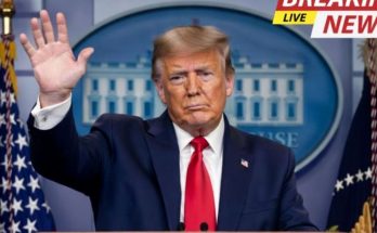 donald Trump raises right hand at White House podium with Breaking News Live banner