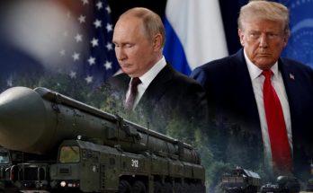 vladimir Putin and Donald Trump with Russian nuclear missile launcher marked 312 and