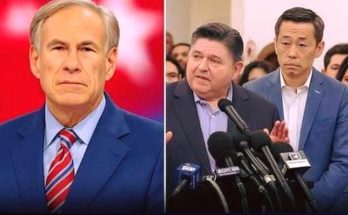 texas Governor Greg Abbott in blue suit and red striped tie beside two men at press