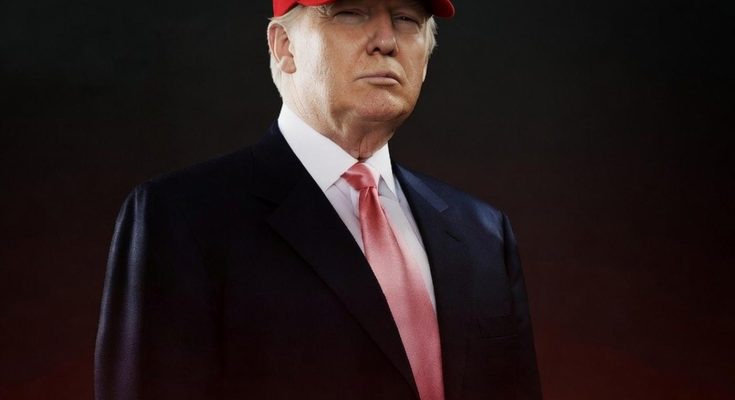 donald Trump wearing a red USA cap and pink tie with a serious expression against a dark