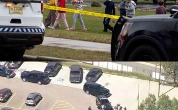 children evacuate past police tape as tactical teams respond to school shooting emergency