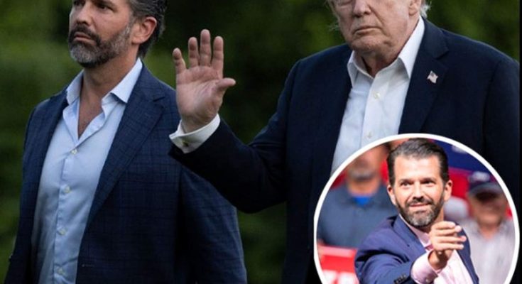 donald Trump waves while walking alongside Donald Trump Jr., with an inset showing Trump