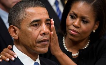 michelle Obama wipes a tear from Barack Obama's cheek during an emotional White House